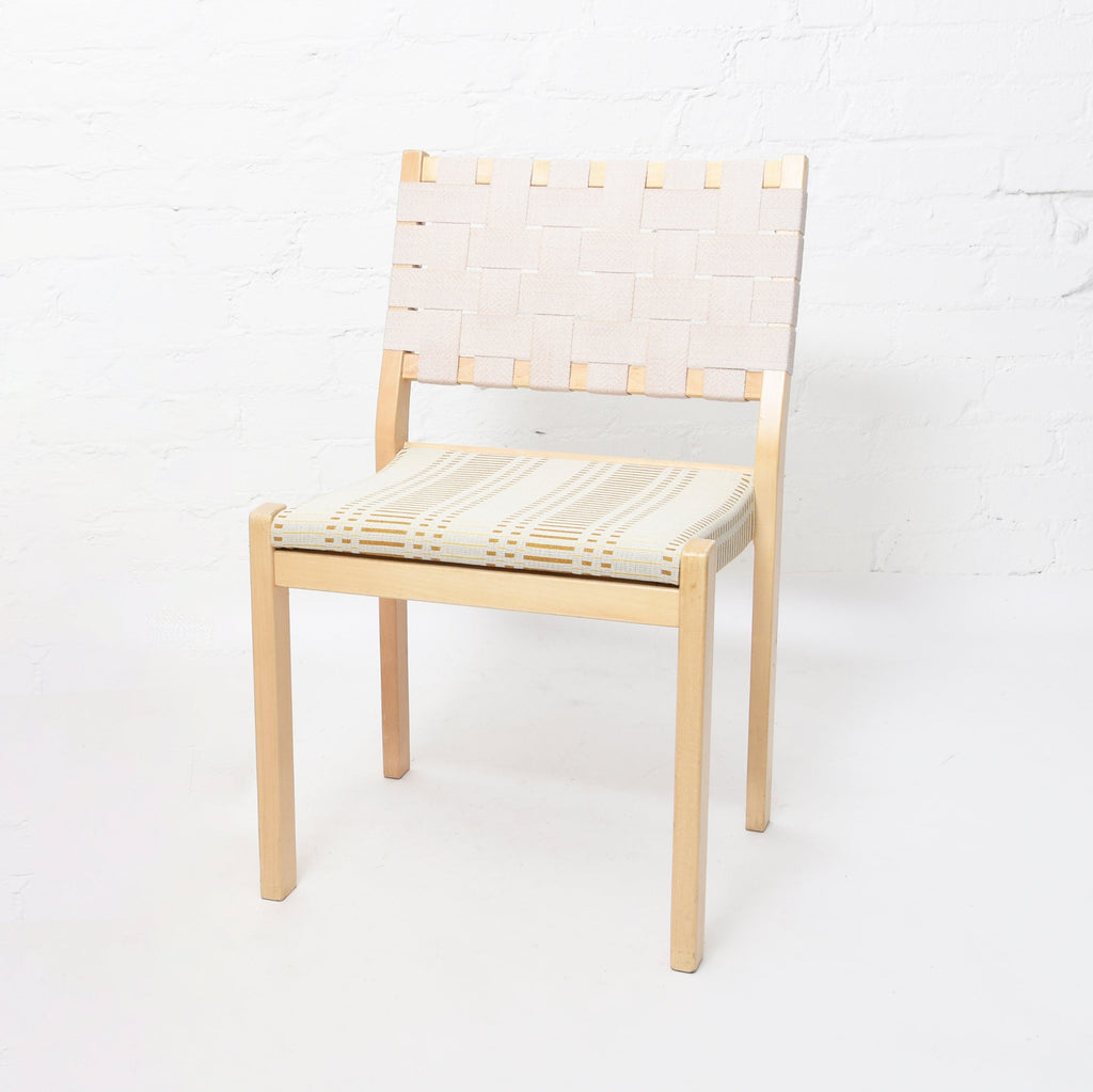 Artek Chair 611, designed by Alvar Aalto in 1929. The chair features a solid birch frame with a linen webbing backrest and a fabric-upholstered seat. The seat has been reupholstered with Johanna Gullichsen's Helios fabric. Dimensions: 48 x 42 x 80 cm (seat height 45 cm). This is a vintage item from the Artek 2nd Cycle collection.
