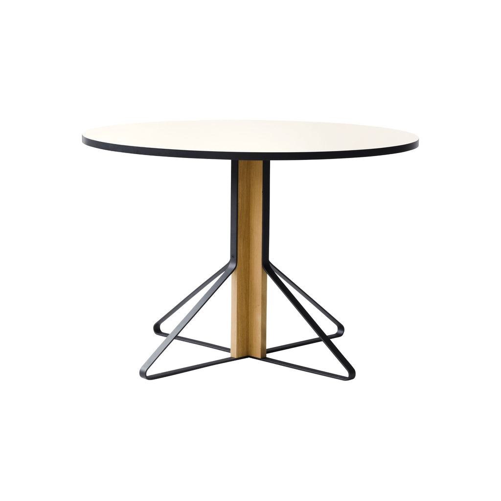Artek Kaari Table REB 004, featuring a round white laminate tabletop supported by a central oak pillar and a steel band base.