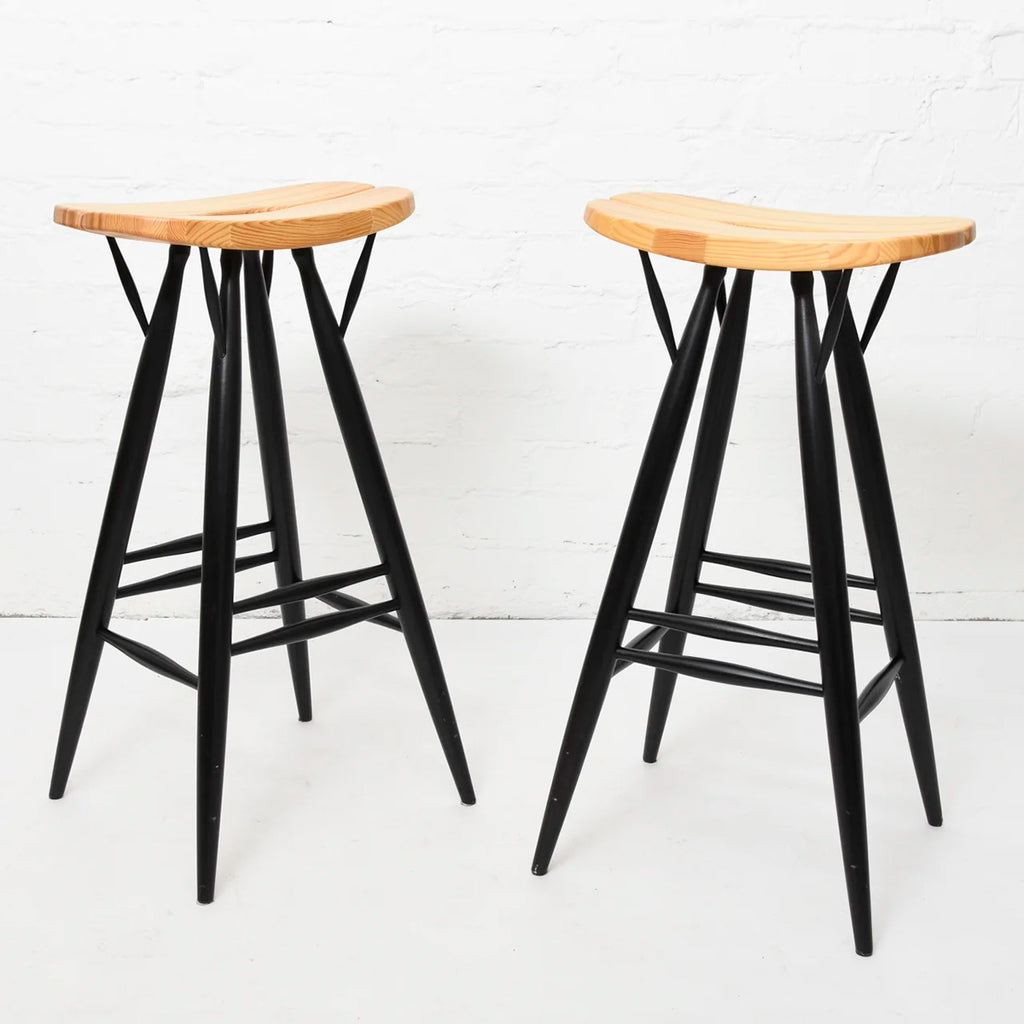 Artek Pirkka Bar Stool, designed by Ilmari Tapiovaara in the 1950s. The stool features a solid birch frame with a pine seat. Dimensions: 28 x 44 x 83 cm. This is a vintage item from the Artek 2nd Cycle collection.