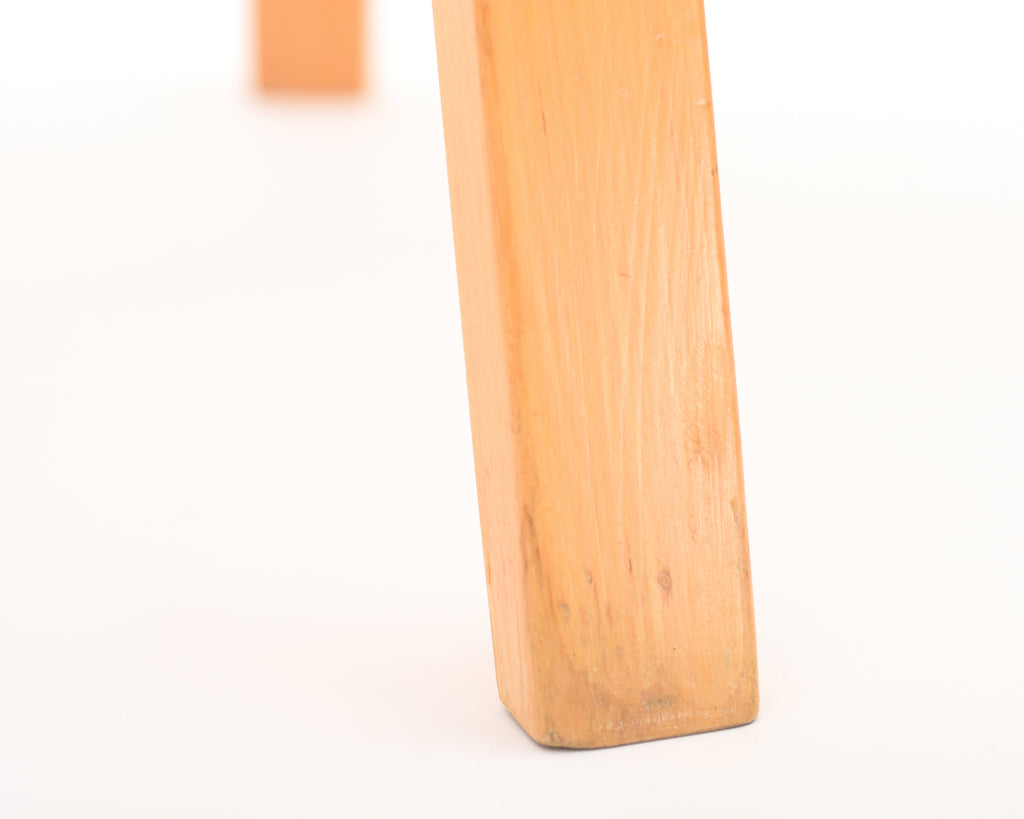 Detailed close-up showing the lower part of the chair leg.