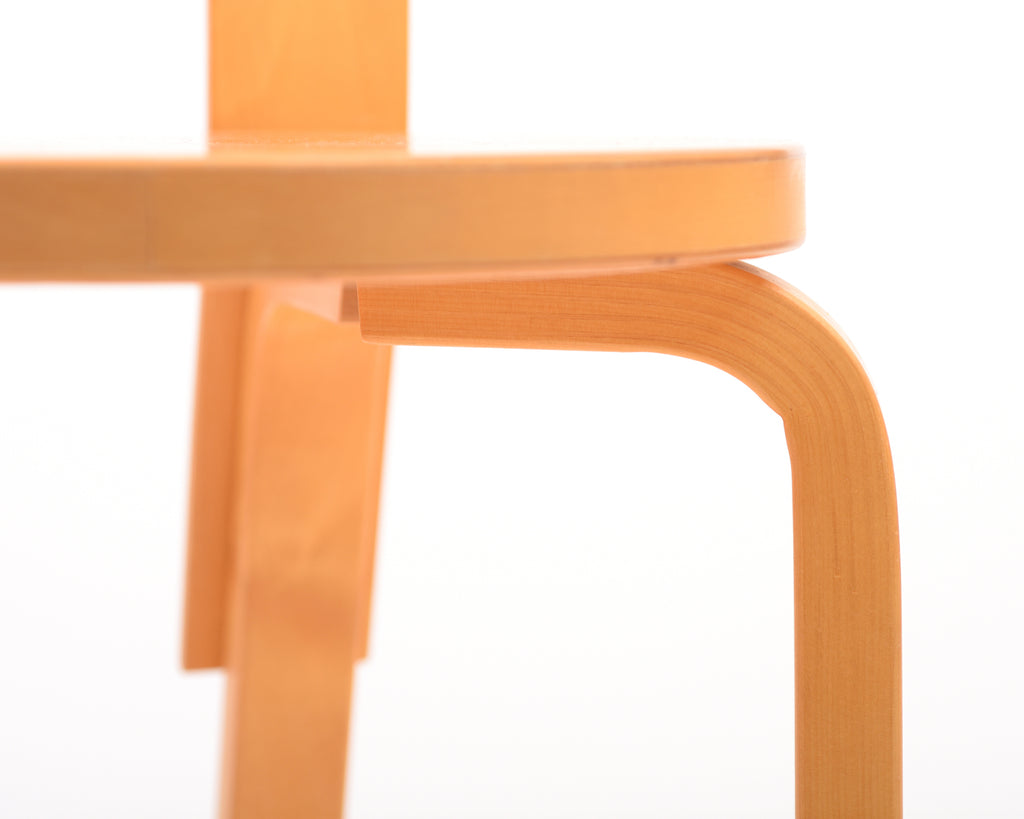 Close-up of a wooden chair with a white background