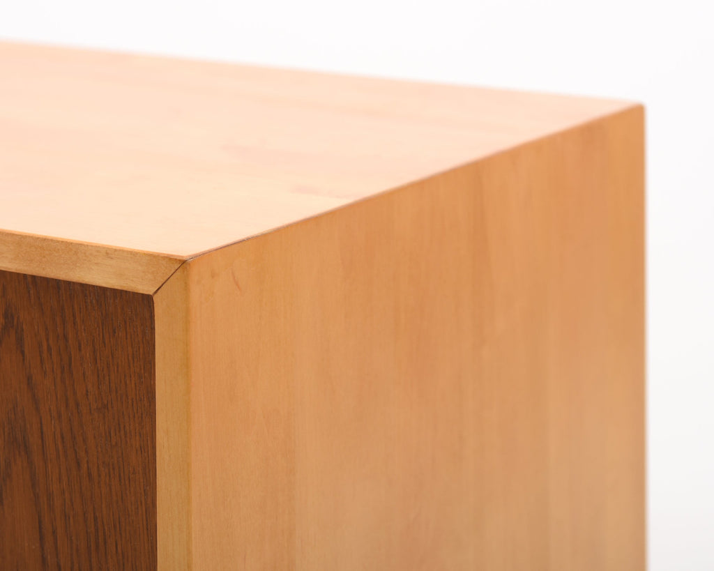 Detail close-up showing the wooden top of the 217 cabinet from one corner.