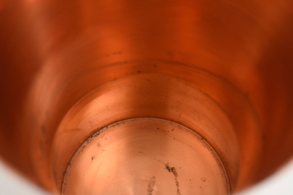 View from inside a copper vase.