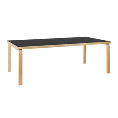 Artek Aalto Table 86 (rectangular) design by Alvar Aalto: Legs and top edge-band natural lacquered solid birch and top surface black linoleum