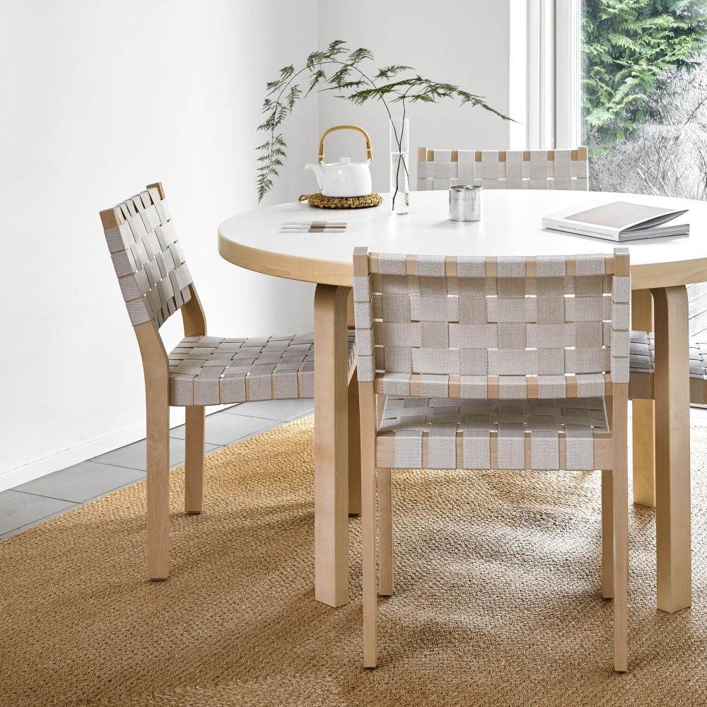 Dining area featuring Aalto Table 91 with a white laminate top, surrounded by four Chair 611.
