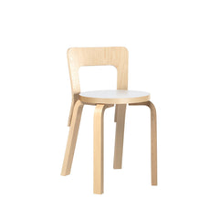 Artek Chair 65 design by Alvar Aalto: Legs and backrest natural
lacquered birch, seat IKI white HPL laminate