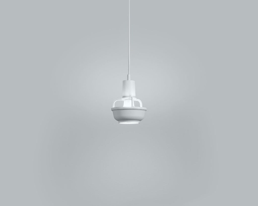 Product image of white Artek Kori Pendant Light. The pendant light is switched on and photographed against a grey background.