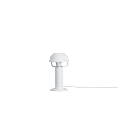 Kori Table Light designed by TAF Studio, featuring a deep matte white aluminium shade with the Kori Collection’s unique 'basket' that casts a direct, glare-free light onto surfaces beneath. The light comes with a white cable.