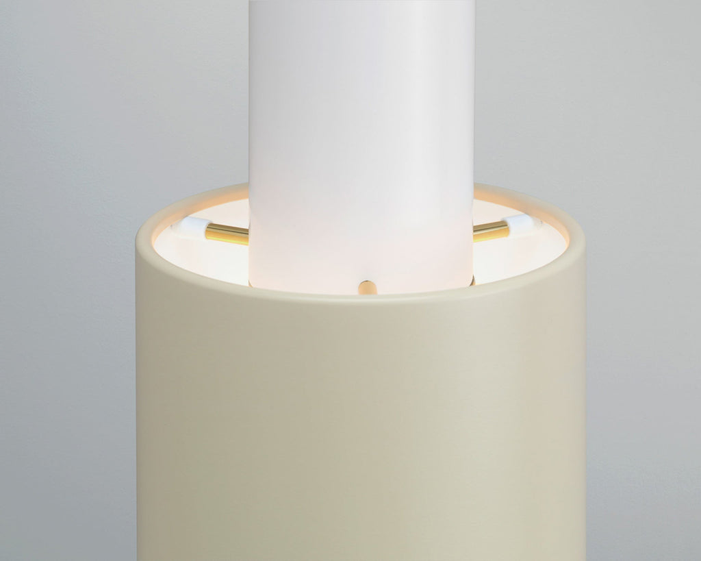 Close-up interior view featuring Pendant Light A110 “Hand Grenade” in duo-tone white linen, focusing on the central section of the fixture against a grey background.