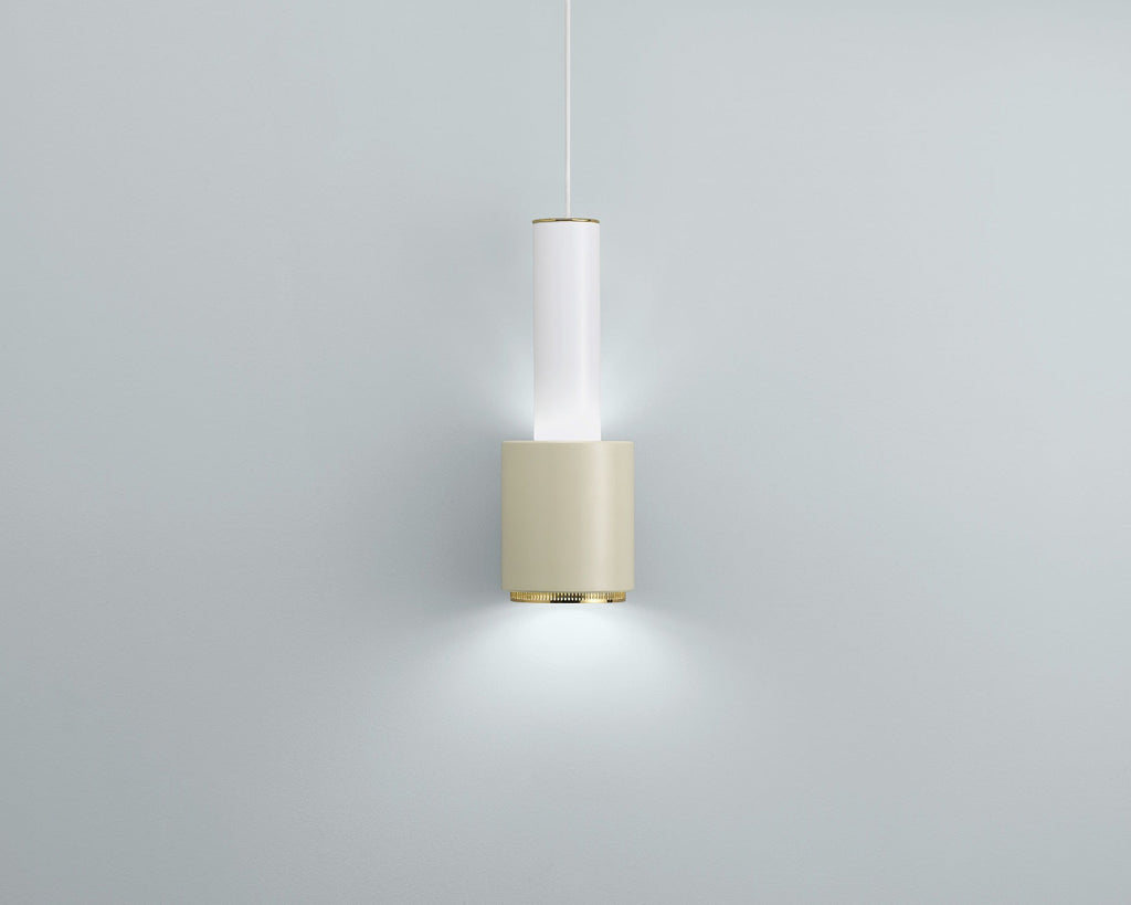 Product image of Pendant Light A110 “Hand Grenade” in duo-tone white linen, photographed against a grey background. The light is switched on.