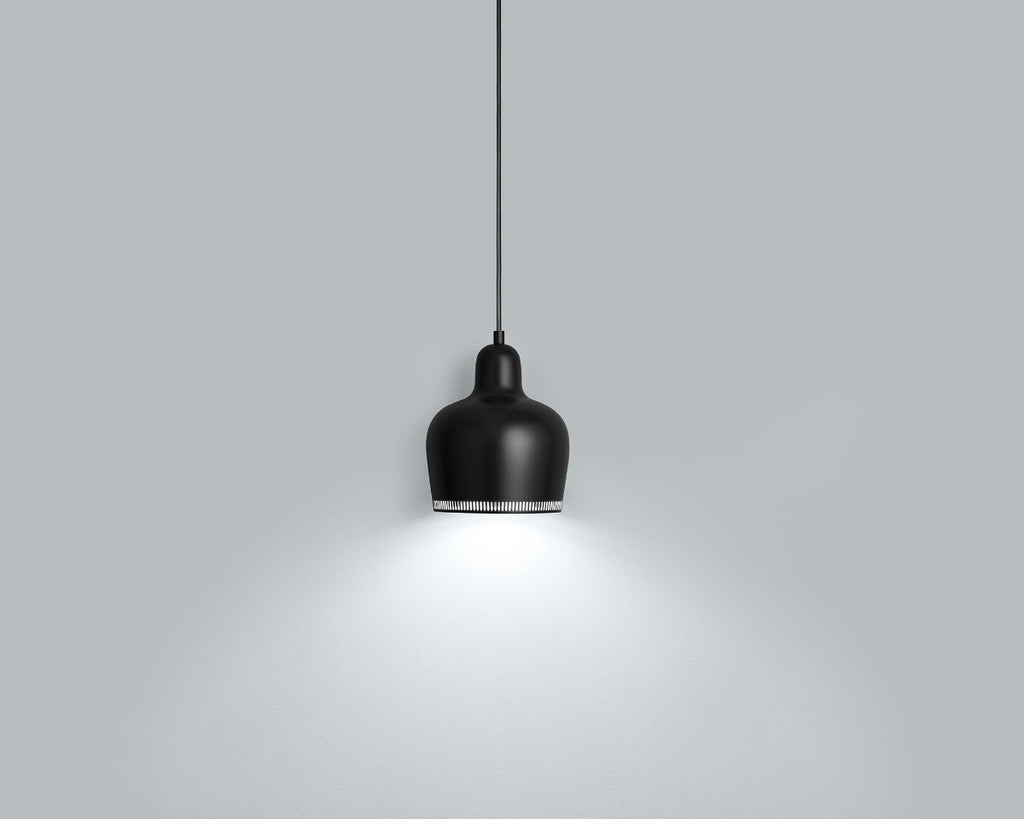 Product image of black Artek Pendant Light A330S “Golden Bell”. The pendant light is switched on and photographed in a grey space.