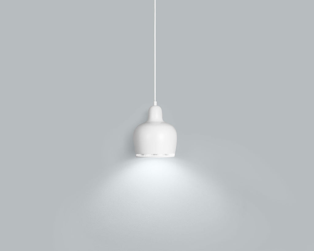 Product image of white Artek Pendant Light A330S “Golden Bell”. The pendant light is switched on and photographed in a grey space.