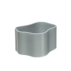 Riihitie Plant Pot (Medium) in light grey, designed by Aino Aalto. Model B, featuring a curvy and organic shape without corners. Handmade from ceramic. Suitable for indoor use only.