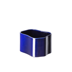 Riihitie Plant Pot (Small) in dark blue, designed by Aino Aalto. Model B, featuring a more curvy and organic shape compared to Model A. Suitable for indoor use only.
