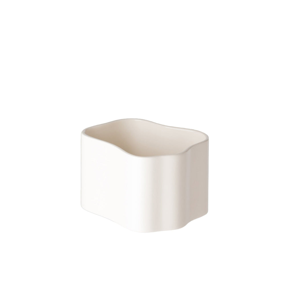Riihitie Plant Pot (Small) in white, designed by Aino Aalto. Model B, featuring a more curvy and organic shape compared to Model A. Suitable for indoor use only.