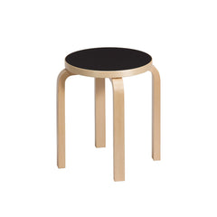 Artek Stool E60, design by Alvar Aalto (four legs): Legs birch natural lacquered, seat black linoleum