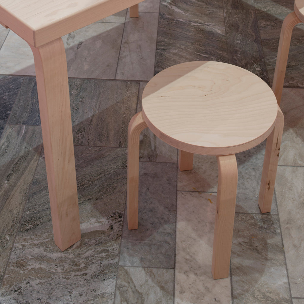 Close-up interior view featuring Stool E60 in wild birch.
