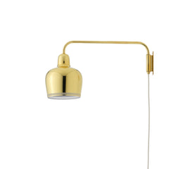 Wall Light A330S 'Golden Bell' designed by Alvar Aalto, featuring a hand-spun brass shade with a perforated rim that filters light beautifully and prevents glare. The light comes with a white cable.