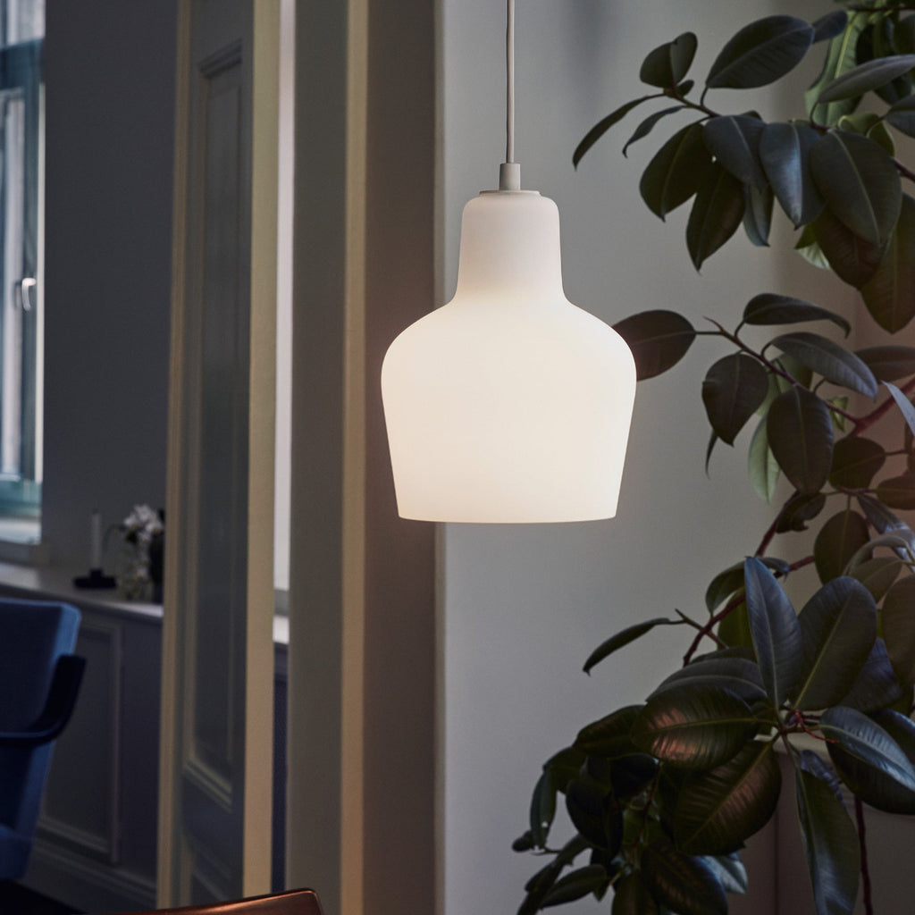 Interior view of a dimly lit space featuring Pendant Light A440 switched on.